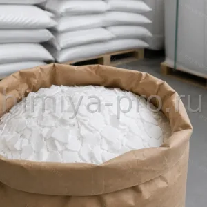 Белые хлопья пищевого хлорида кальция E509 в мешке — добавка для сыроделия, консервирования огурцов и источник кальция