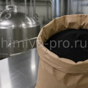 Тонкодисперсный чёрный порошок активированного угля ОУ-А в бумажном мешке на пищевом столе осветления сиропов