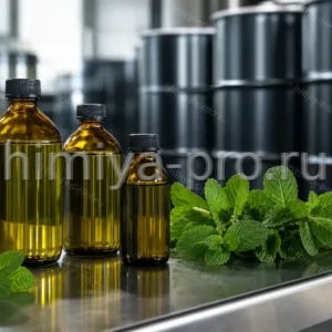 Янтарные флаконы жидкого экстракта мяты перечной на стальном столе рядом с листьями мяты и бочками